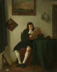 Interior con un hombre leyendo