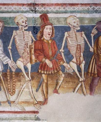 Iglesia fortificada de Hrastovlje, Iglesia de la Trinidad, La Muerte acompañando a un comerciante y un banquero rico, Danza de la Muerte (1490), detalle de frescos de Janez Iz Kastva, Eslovenia