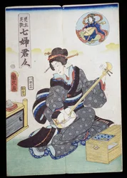 Mujer tocando el shamisen