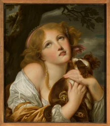 Muchacha con un perro en brazos