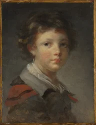 Un niño con una capa forrada de rojo