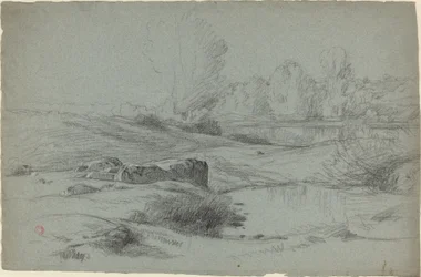 Un prado rocoso junto a un río