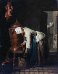 Mujer sacando agua de la cisterna