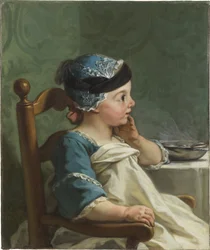 Niño en una silla alta