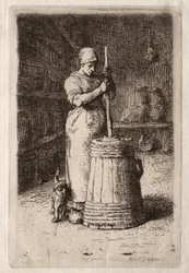 Una mujer batiendo mantequilla