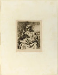 Mujer alimentando a su hijo