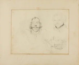 Tres caricaturas de cabezas