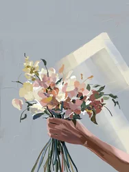 Mano con flores de pastel