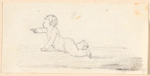 Un niño desnudo gateando