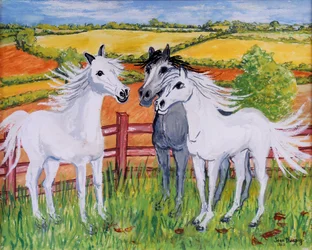 Tres caballos juguetones