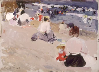 Personas sentadas en la playa
