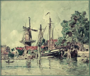En Holanda, los barcos cerca del molino