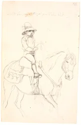 Niño pequeño montando un caballo