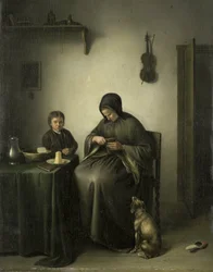 Una mujer cortando pan