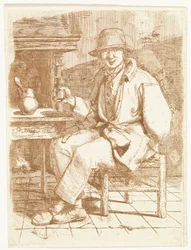 Hombre sonriente con vaso en mano