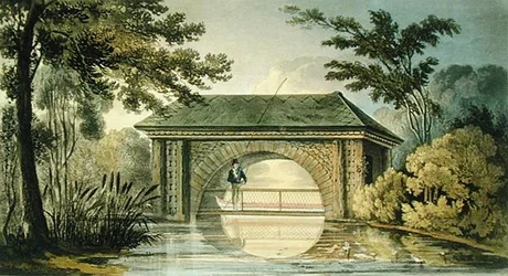 Un puente y una casa de botes