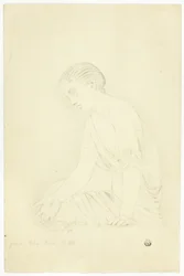 Estatua de niña sentada