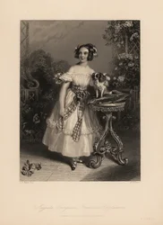 Augusta Georgina Frederica Fitzclarence, hija de Lord Frederic Fitzclarence, hijo ilegítimo del Rey Guillermo IV. Lleva el cabello en rizos y cintas, y viste un vestido con los hombros descubiertos atado con una faja, sostiene un spaniel King Charles en un