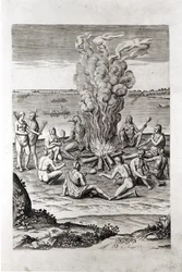 Indios rezando alrededor de un fuego, grabado de 