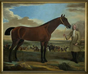 Scarr, un caballo de carreras bayo sostenido por su entrenador, A. Scottman