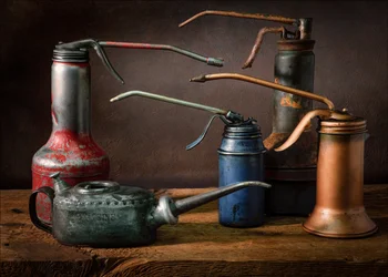 Colección de latas de aceite antiguas