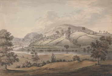 Paisaje montañoso con pueblo y río