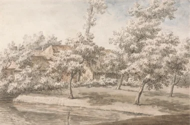 Un huerto junto a un arroyo