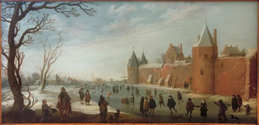 Patinadores en el foso de la ciudad