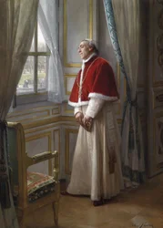 Un cardenal esperando en una ventana