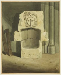 Fuente antigua sacada de la pared sur de la cripta de la Iglesia de St John