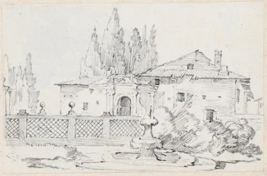 Casa y árboles al otro lado de un muro de jardín