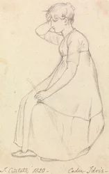 Chica sentada sujetando un palo