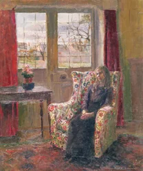 En el sillón junto a la ventana