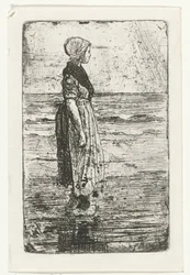 Mujer de pie en la playa