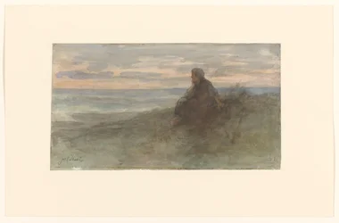 Mujer sentada en una duna junto al mar
