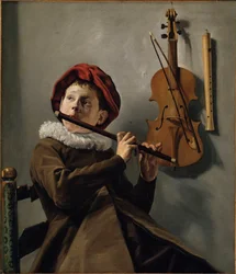 Niño tocando la flauta
