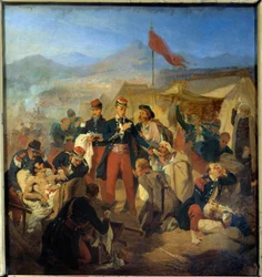 Guerra de Crimea: el cirujano militar Scrive cura a los heridos después de la batalla de Inkerman del 5/11/1854. Pintura de Jules Rigo (1810-1892), 1854, Musée du Val-de-Grâce, París