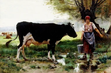 Una lechera con su vaca