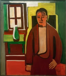 Hombre, de pie frente a la ventana