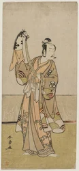 Bando Hikosaburo III sosteniendo una marioneta de mano, mediados de la década de 1770