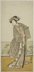 El actor Nakamura Tomijuro I como la dama Hangaku (Hangaku Gozen) en la obra Wada-gassen Onna Maizuru, representada en el teatro Nakamura en el séptimo mes, c.1777 (xilografía en color; hosoban)