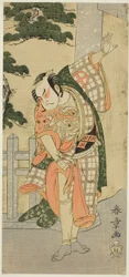 El actor Otani Hiroji III en una pose escénica (Mie) frente a una puerta de santuario