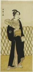 El actor Sawamura Sojuro III como el peluquero Jirokichi en la obra Shida Choja-bashira, representada en el Teatro Nakamura en el octavo mes de 1781