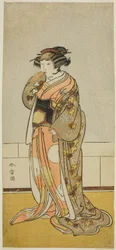 El actor Yamashita Kinsaku II como Lady Kikusui en la obra Kaeribana Eiyu Taiheiki, representada en el Teatro Nakamura en el undécimo mes, 1779