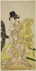 El actor Yamashita Kinsaku II como Tsukimasu, actuando como Sakura-maru, en la obra Miya-bashira Iwao no Butai, representada en el Teatro Morita en el séptimo mes de 1773
