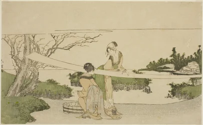 Dos mujeres estirando tela