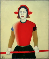 Niña con bastón rojo