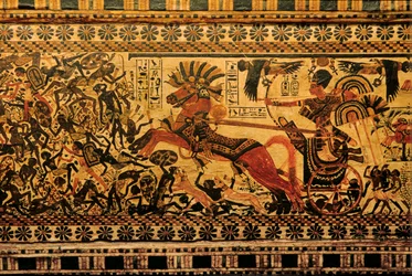Caja pintada que representa a Tutankamón como guerrero en carro persiguiendo a unos nubios, 2007 (foto)