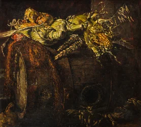 Barril viejo y mazorcas de maíz