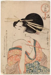 Geisha sosteniendo una pipa